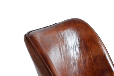 Silla tapizada en cuero marrón de Giner y...