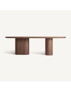 Mesa de comedor Aciera de estilo contemporáneo, fabricada en madera DM con chapa de nogal en color marrón. Producto desmontable.