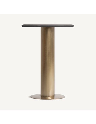 Mesa bar Tasque en acero dorado y porcelánico...