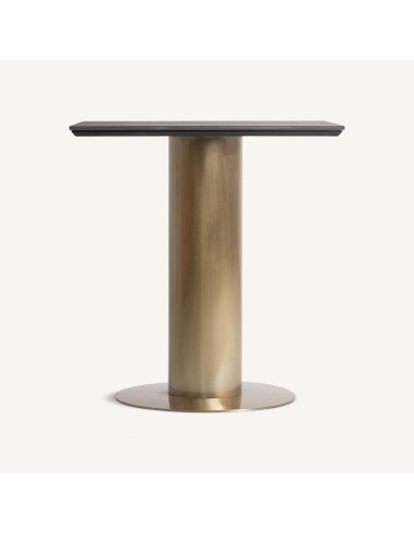 Mesa bar Tasque en acero dorado y porcelánico...