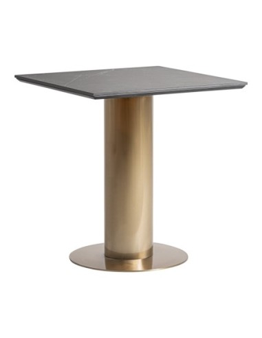 Mesa bar Tasque en acero dorado y porcelánico...